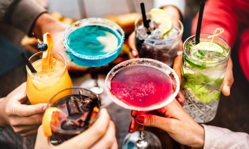 People hands toasting multicolored fancy drinks – Young friends having fun together drinking cocktails at happy hour – Social gathering party time concept on warm vivid filter People hands toasting multicolored fancy drinks - Young friends having fun together drinking cocktails at happy hour - Social gathering party time concept on warm vivid filter
